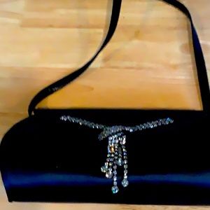 Stuart weitzman small evening bag.  Very nice shape